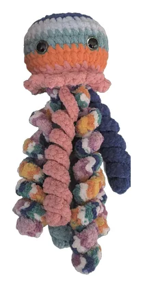 Crochet jellyfish with a striped cap and curly rainbow tentacles